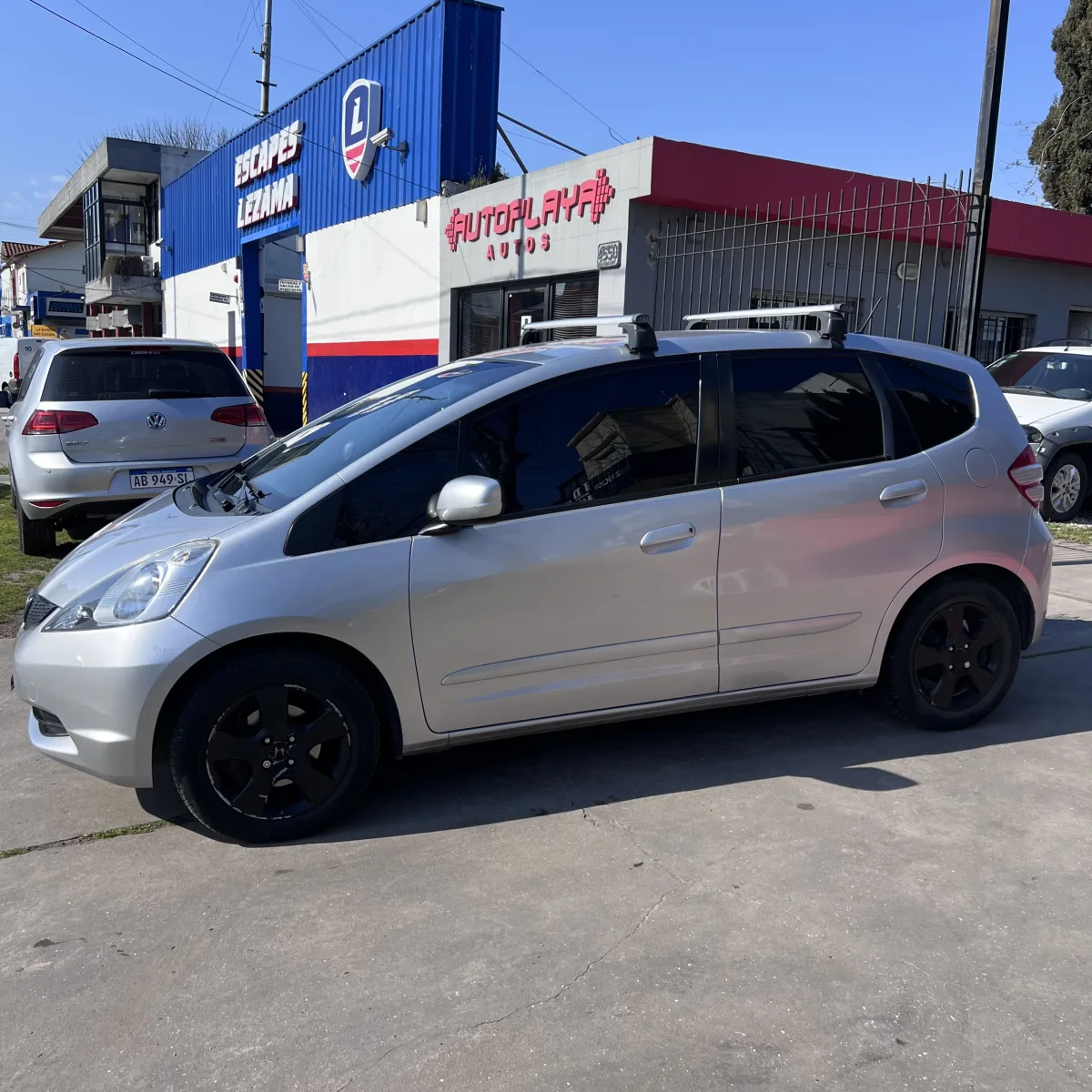 Honda Fit Lx — Costado